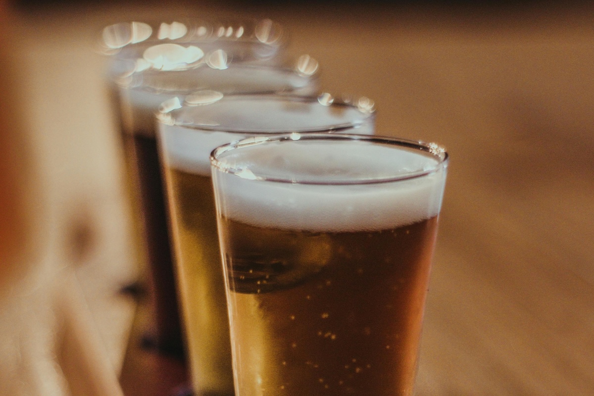 Three beers lined up to be tasted at a brewery on Cape Cod.