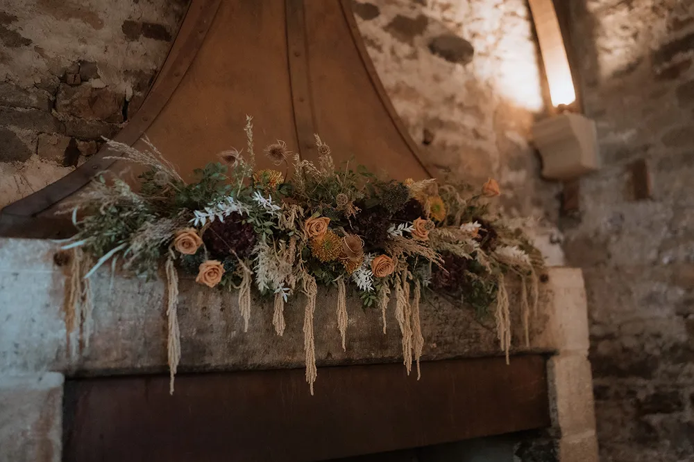 floral mantelpiece at wedding reception
