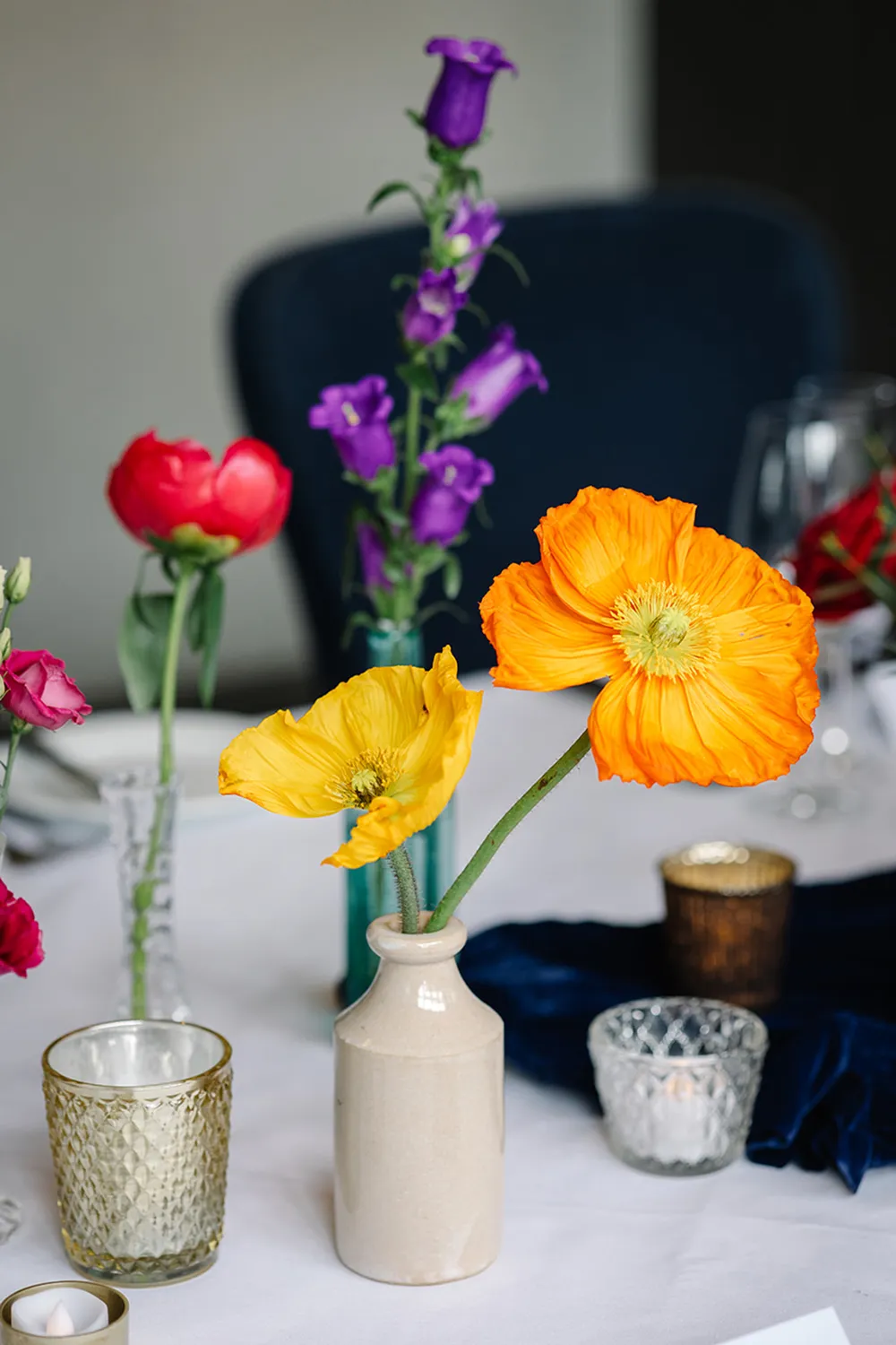 small bud vases on table