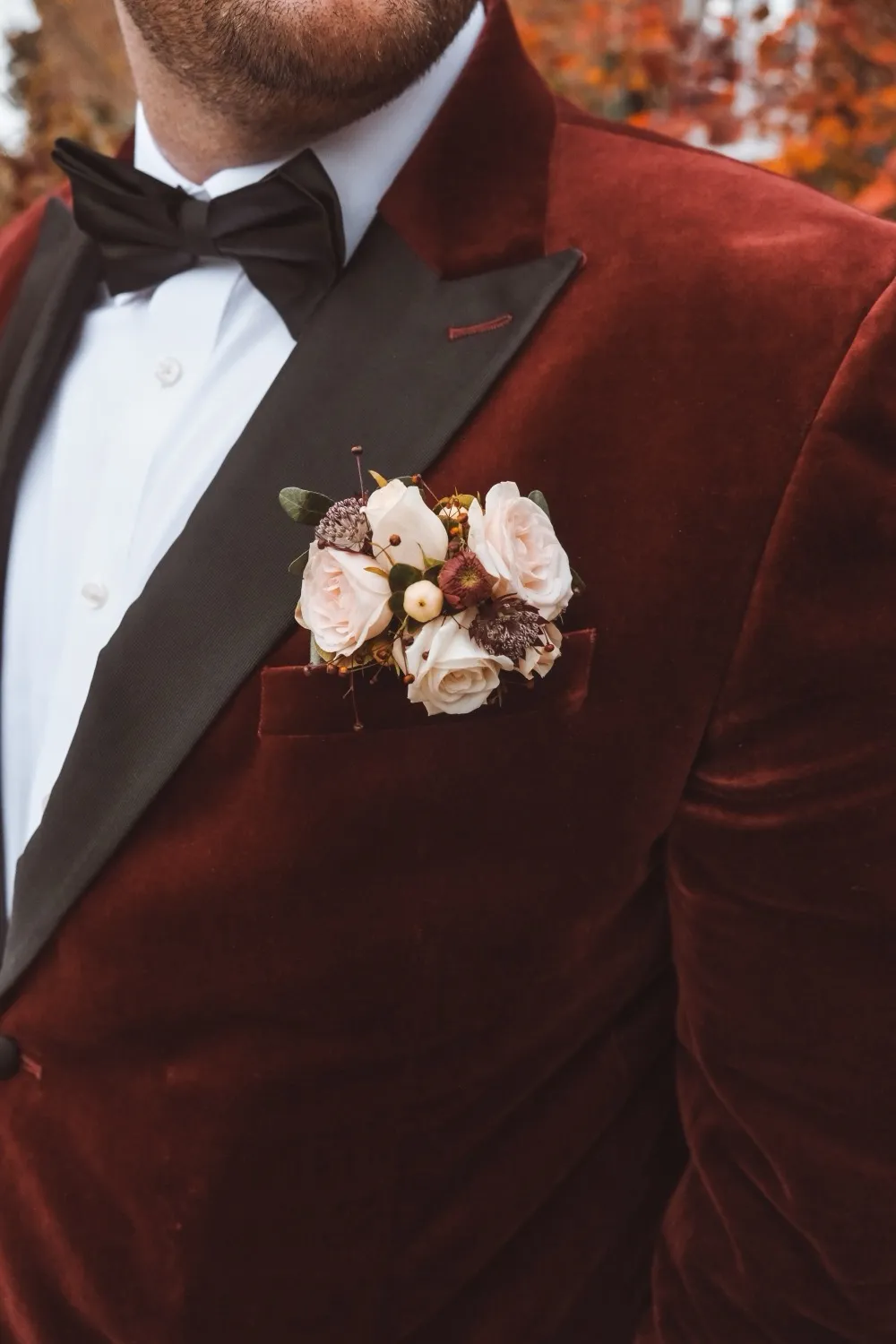 buttonhole on red velvet jacket