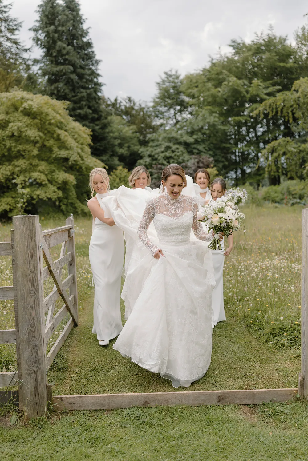 bride holding rust orange wedding bouquet