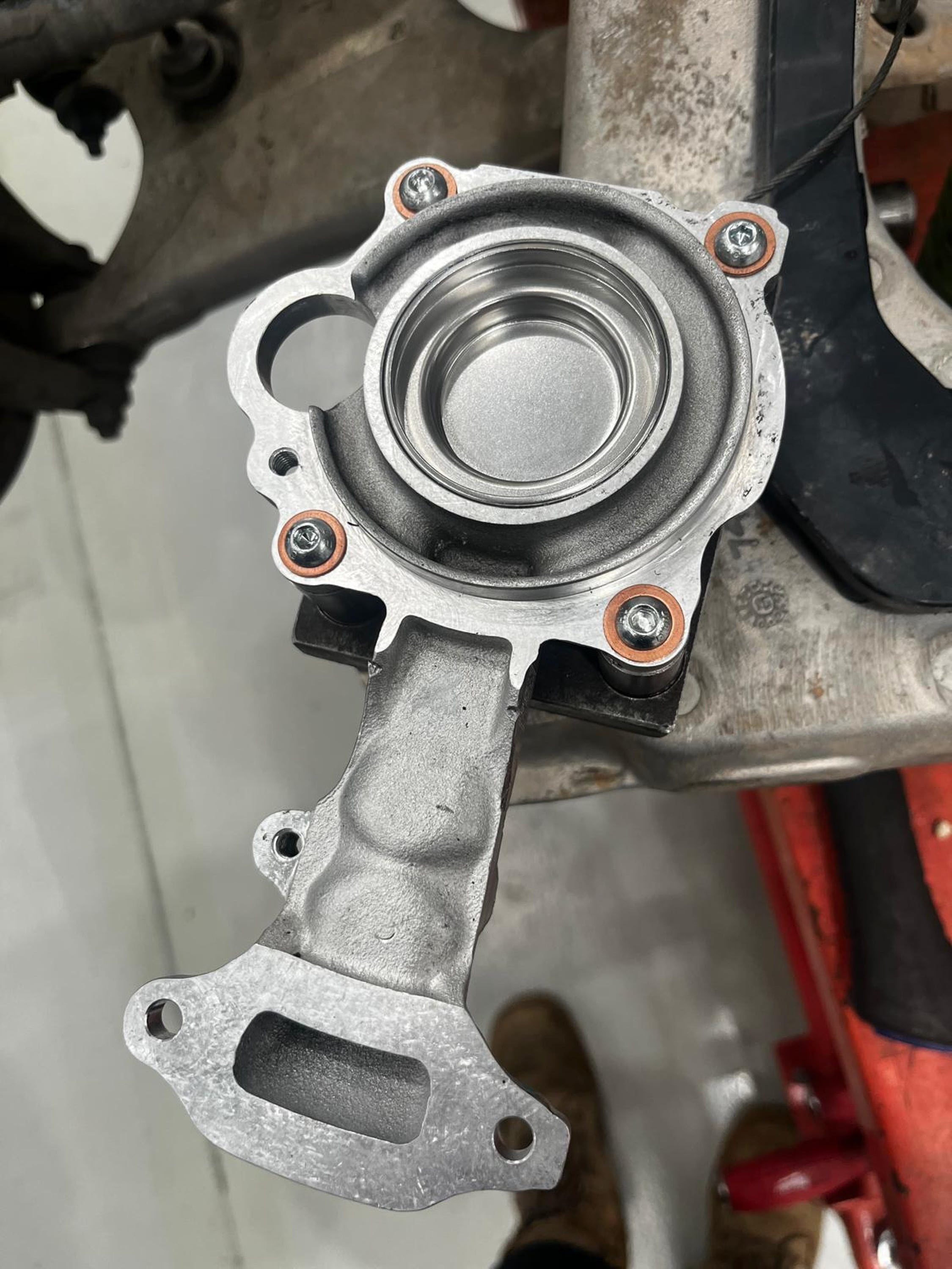 Cleaned bearing housing with new copper seals installed