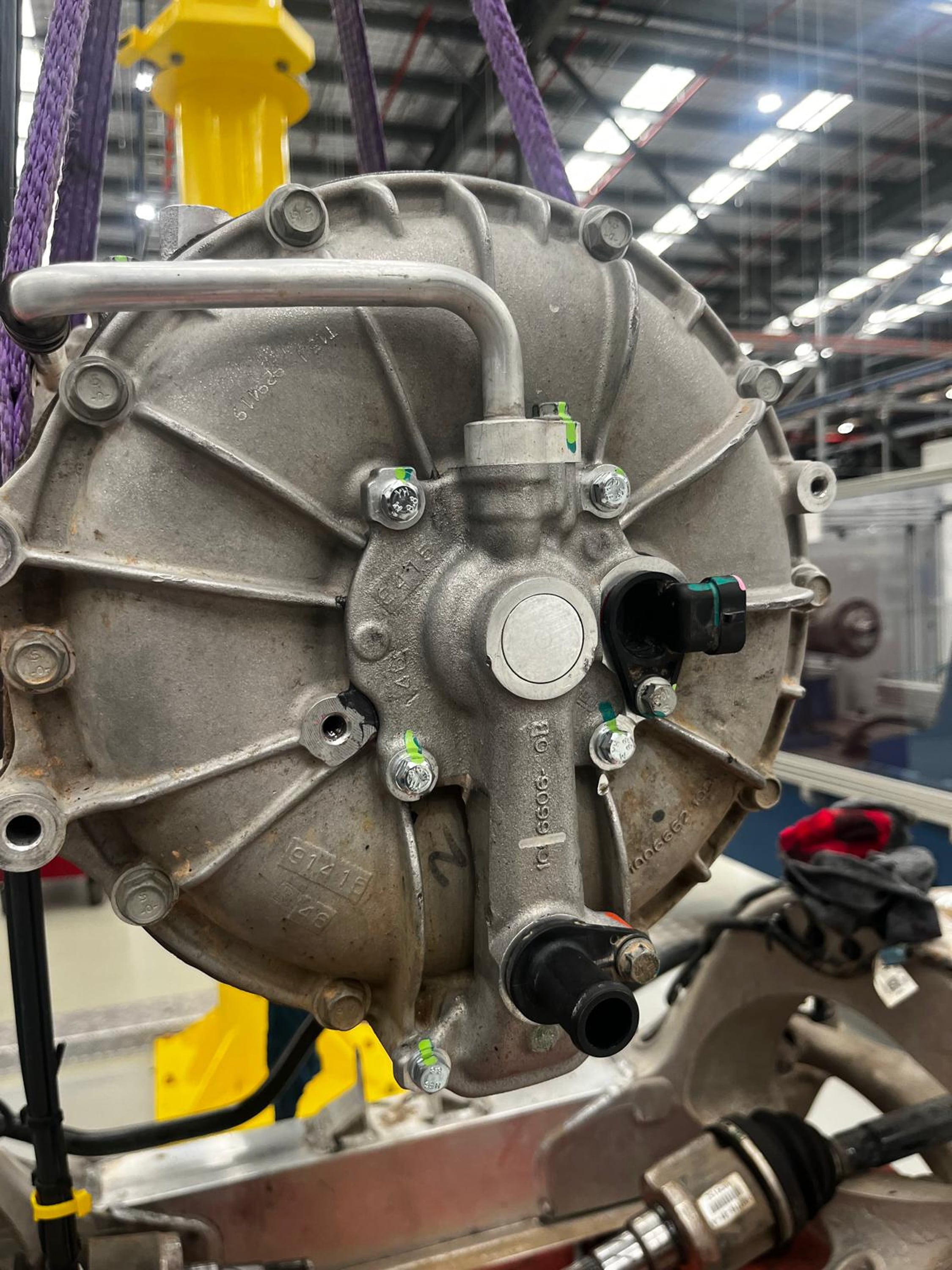 Reassembled LDU endplate with fresh bolts and torque marks