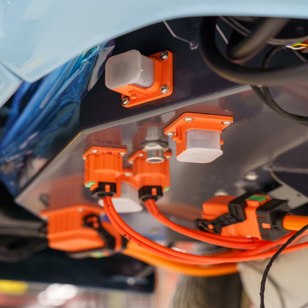 High voltage cables connecting the rear battery pack. System in development. 