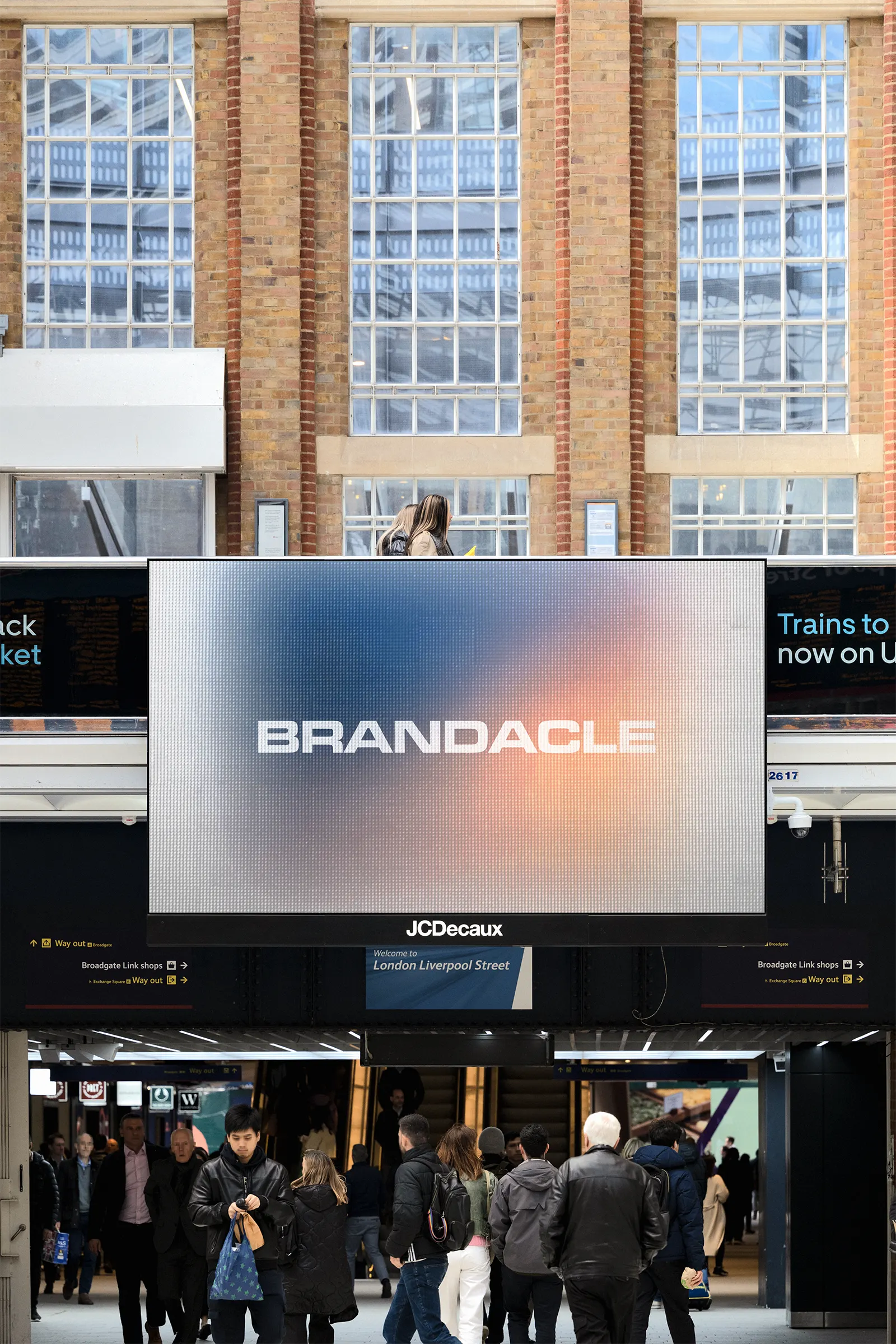 Digital screen billboard mockup in a train station in London, United-Kingdom, UK - underground poster subway photoshop mockup for graphic design UK24LON005