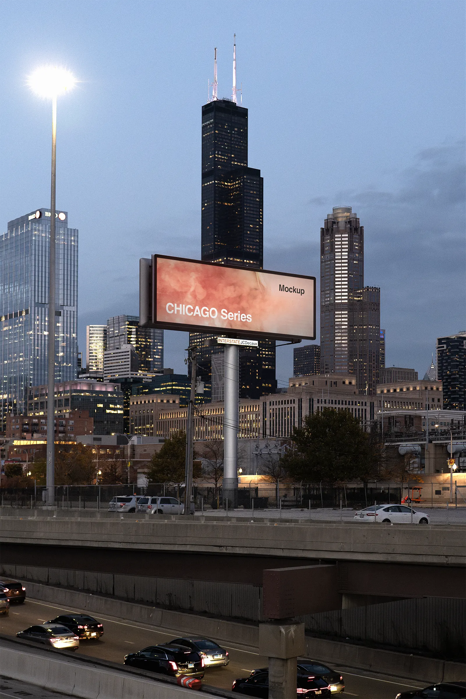 Billboard screen mockup by a highway in front of the Sears Tower skyscraper in Chicago, United States - skyline poster photoshop mockup for graphic design US23CHI0604