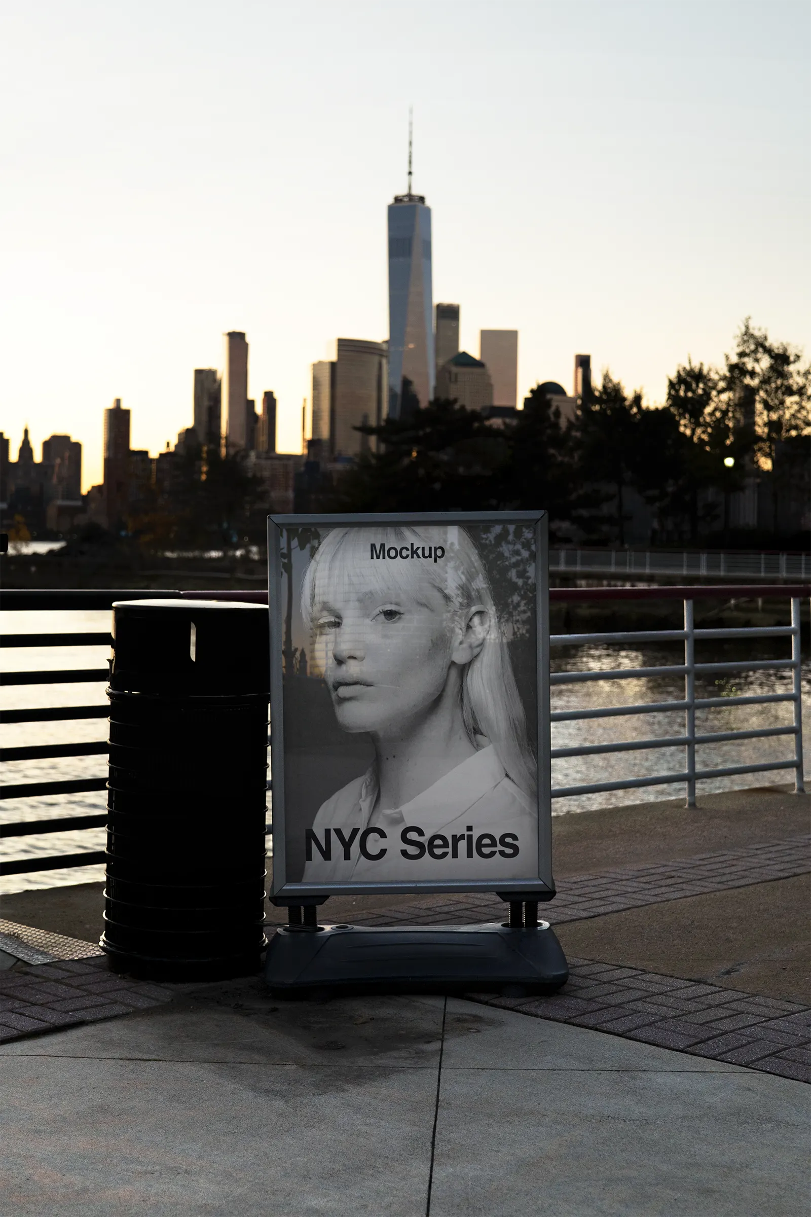 Poster mockup in front of the Manhattan Skyline at dawn, New York, United States - NY billboard photoshop mockup for graphic design US23NY0005