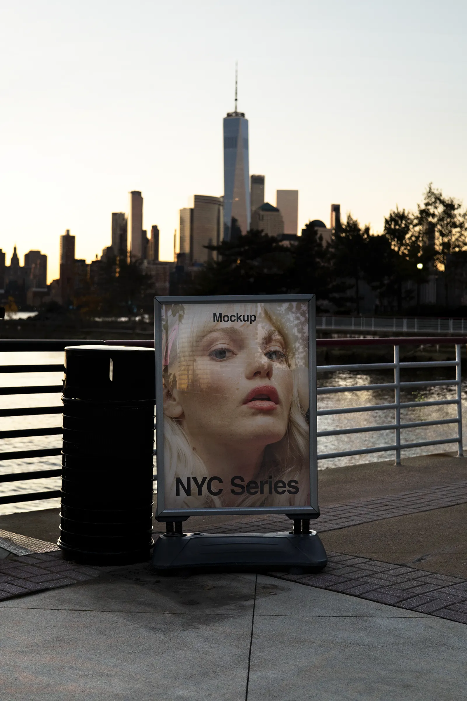 Poster mockup in front of the Manhattan Skyline at dawn, New York, United States - NY billboard photoshop mockup for graphic design US23NY0005