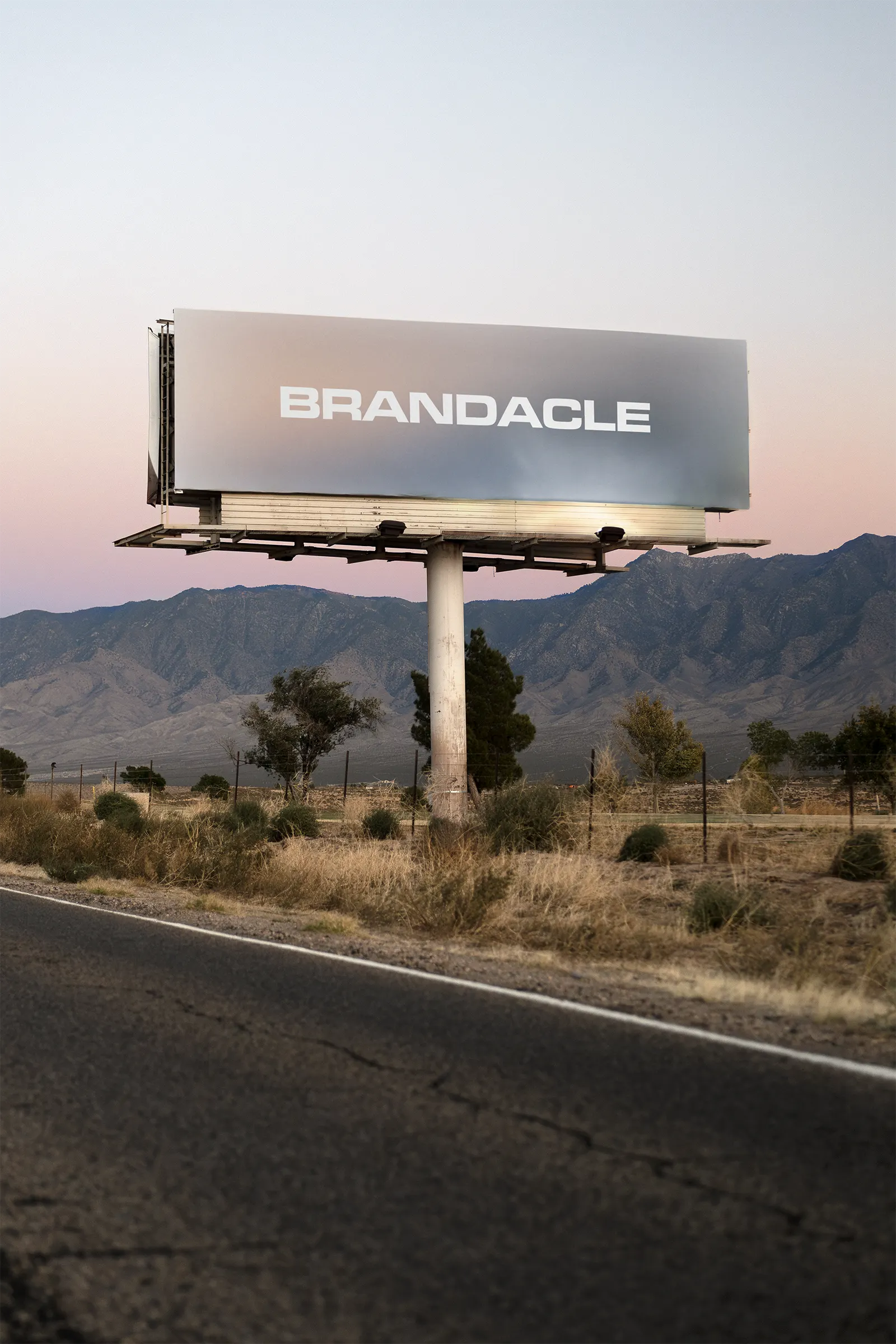 Billboard mockup by the Interstate 15 at dusk on the road to Las Vegas, American West, Nevada, United States - desert poster screen photoshop mockup for graphic design US23WEST0728