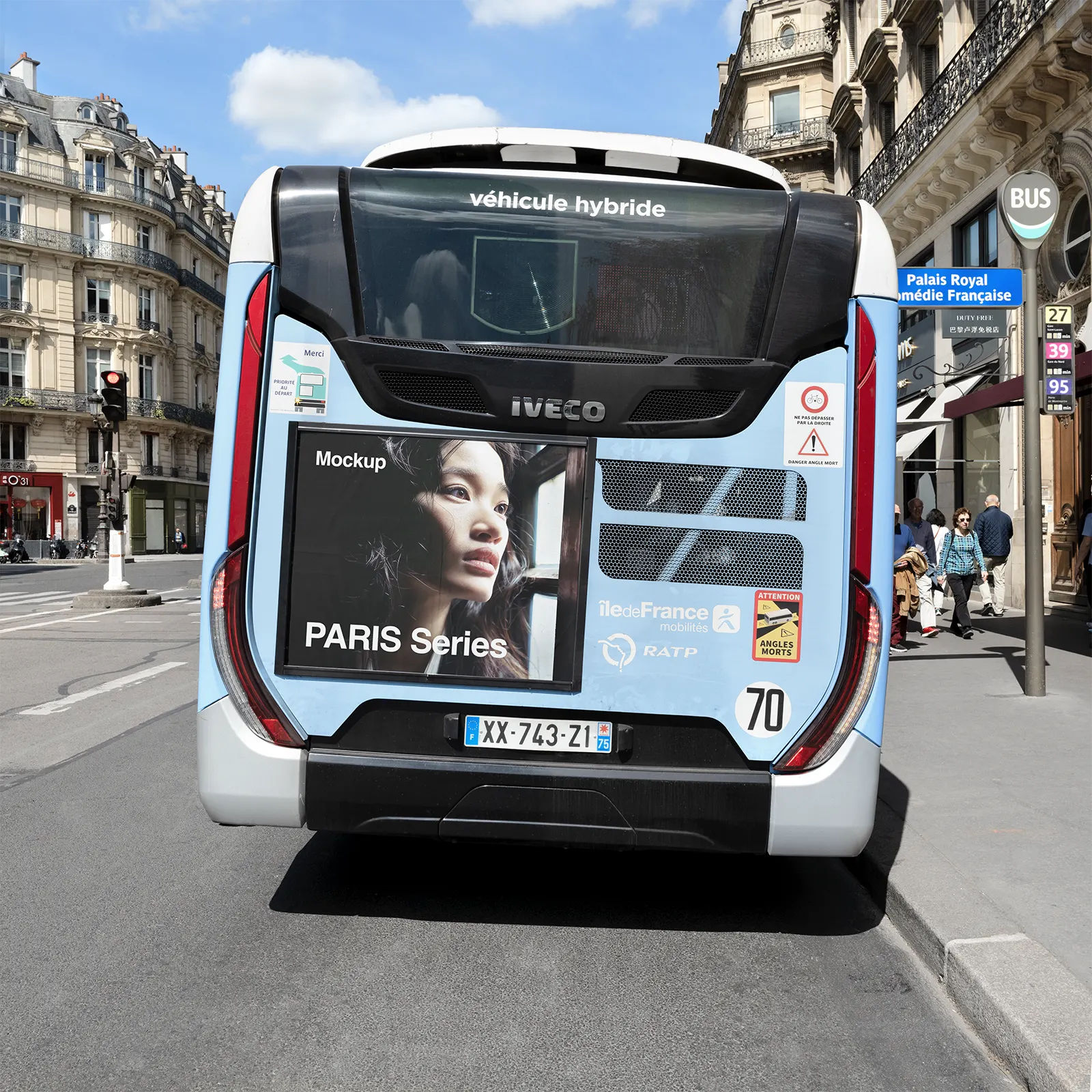 Advertising poster on a bus at Palais Royal, Central Paris - on the avenue to the 1861 Garnier Opera.
