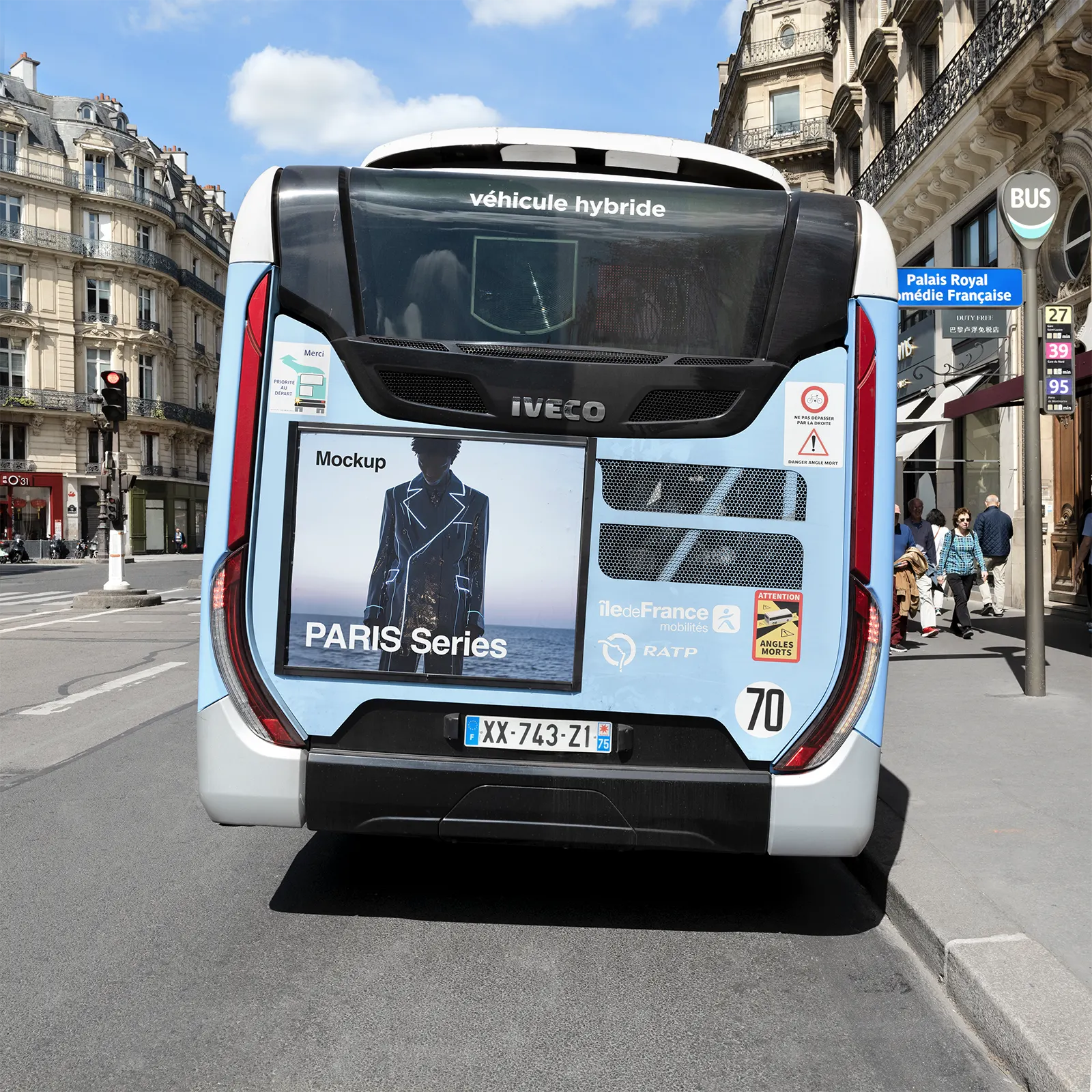 Advertising poster on a bus at Palais Royal, Central Paris - on the avenue to the 1861 Garnier Opera.