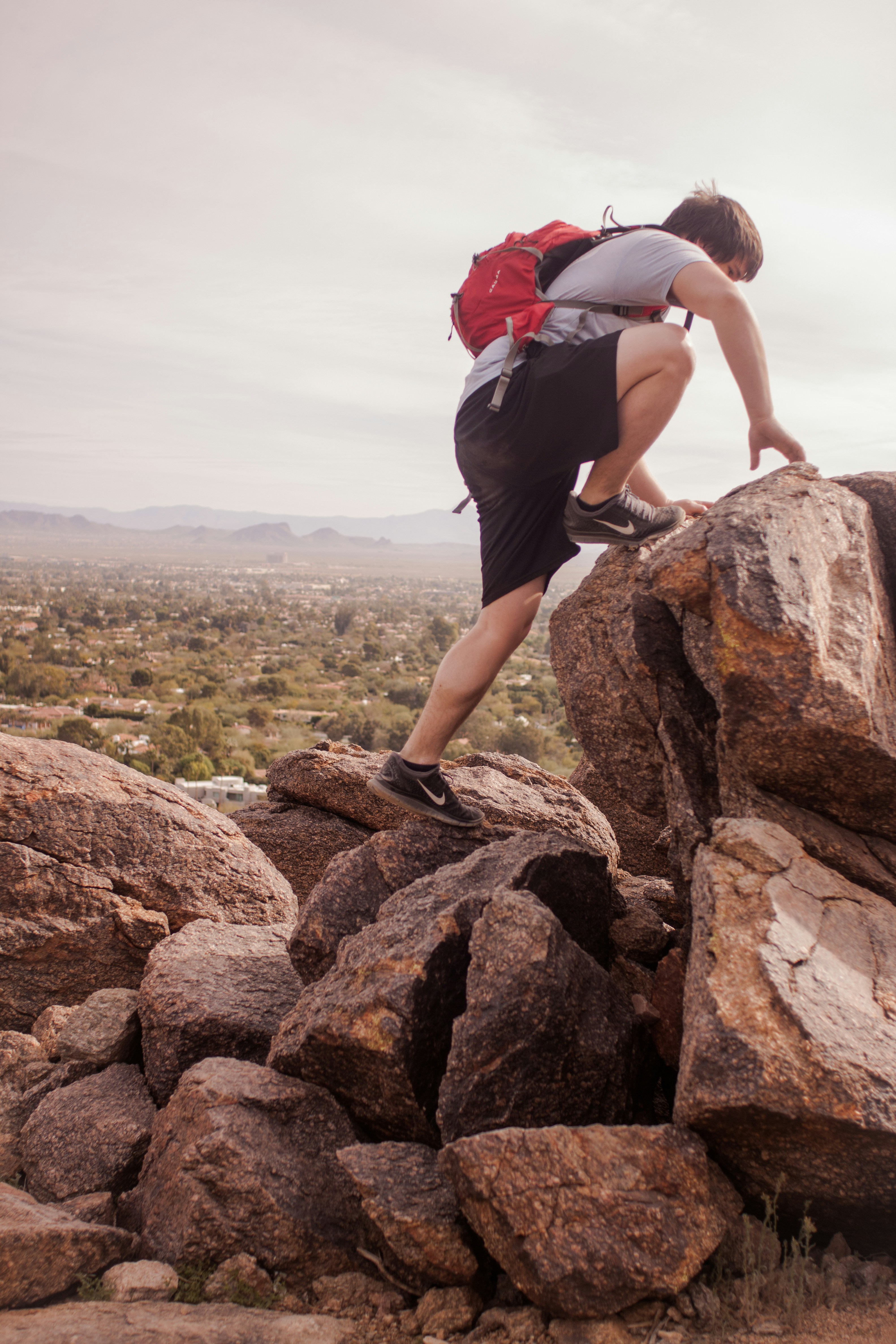 Person climbing on rocks