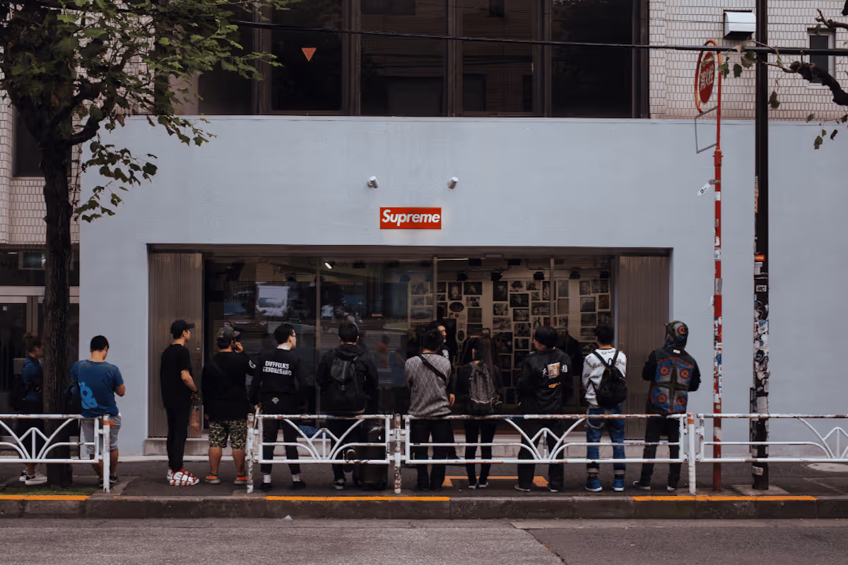 Crowd of customers outside a pop-up retail store.