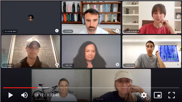 Video conference screen showing eight participants in a grid layout during an online meeting.