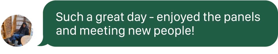 Bright hotel room with a large bed, wooden furniture, a wall-mounted TV, and a balcony with palm trees visible outside.