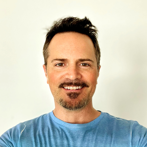 Justin smiling warmly