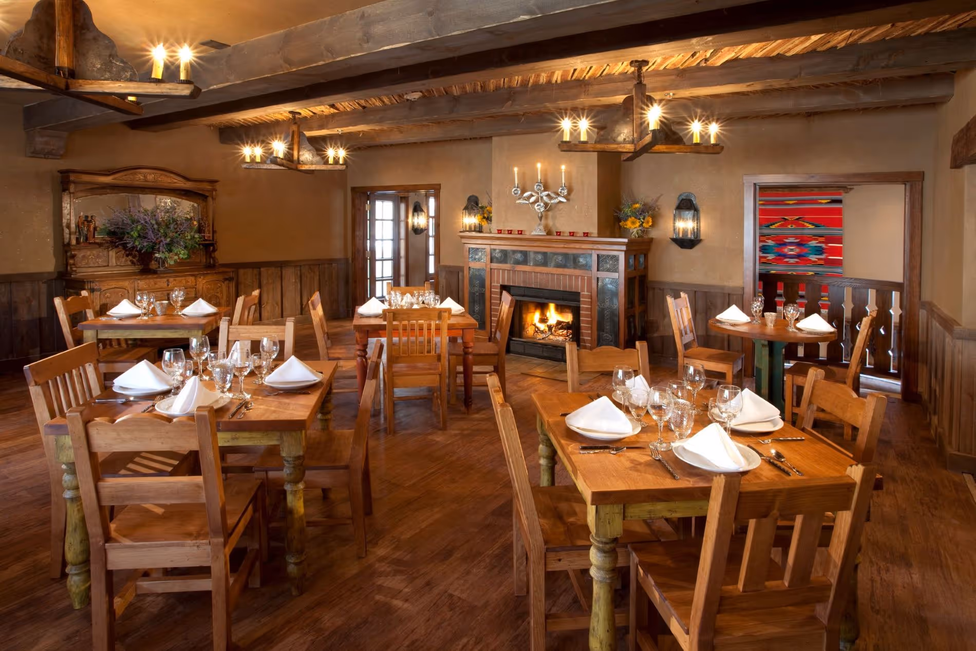 El Rincon patio with umbrellas and tables set for service