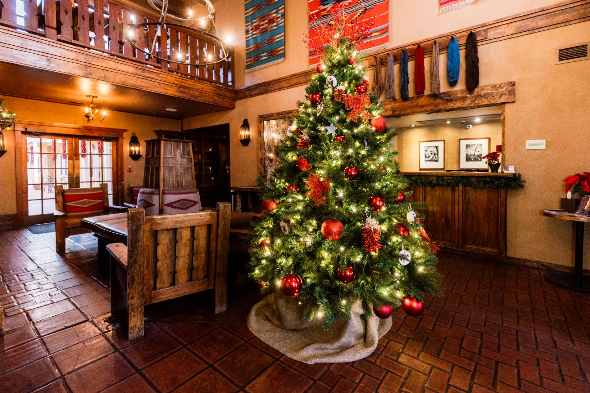 Lobby with decorated Christmas tree with red baubles