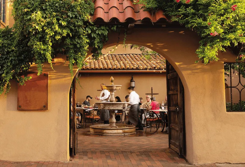 Patio at Wolf and Roadrunner with people dining