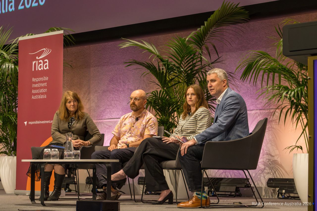 Four panellists seated on stage at the RIAA Conference Australia 2026, discussing AI for responsible investors, with RIAA branding and plants in the background.