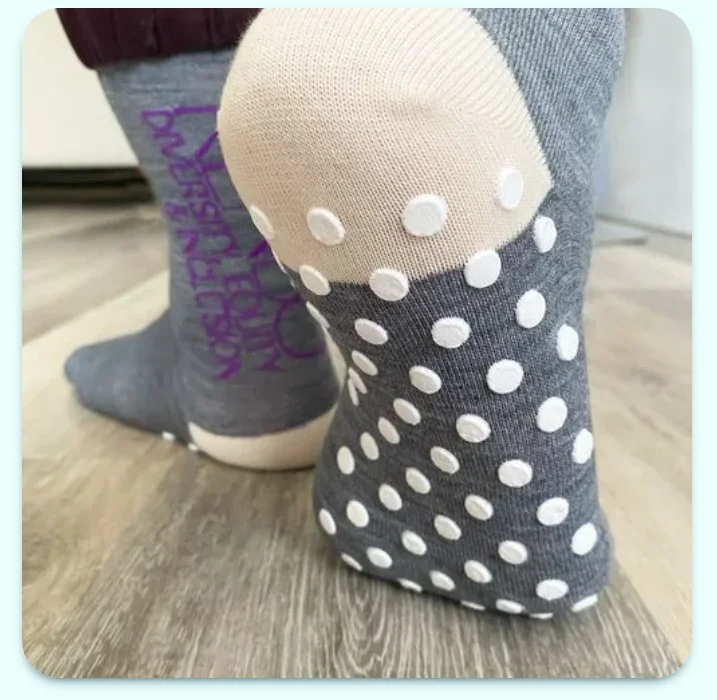 A pair of hospital non slip socks with grippy soles to prevent falls at psychiatric wards