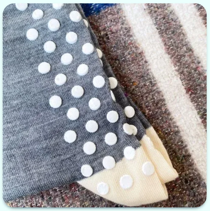 A pair of custom hospital grip socks by Sockrates 