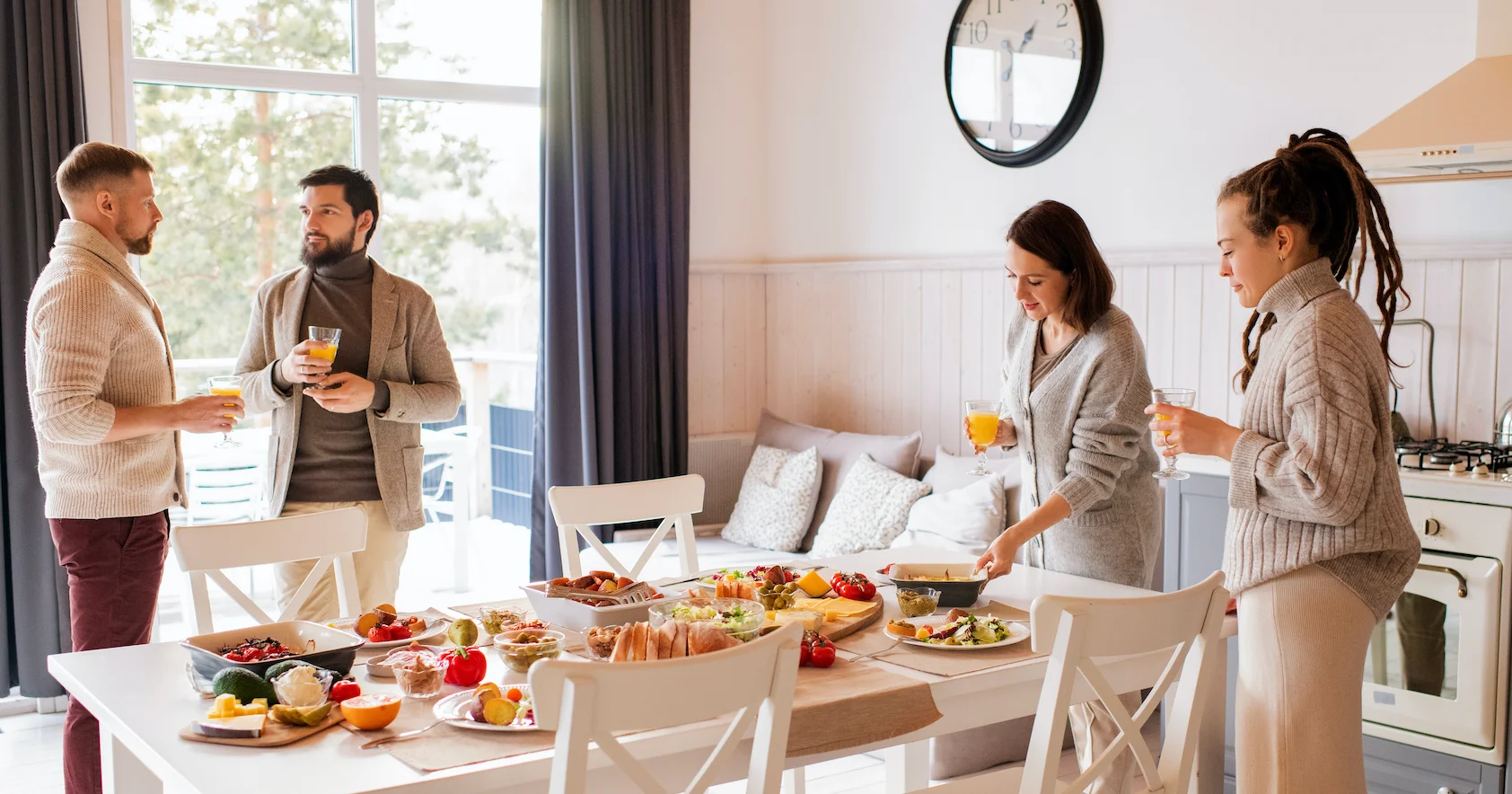 A group of people gathering for a gourmet breakfast to raise money for a baseball team