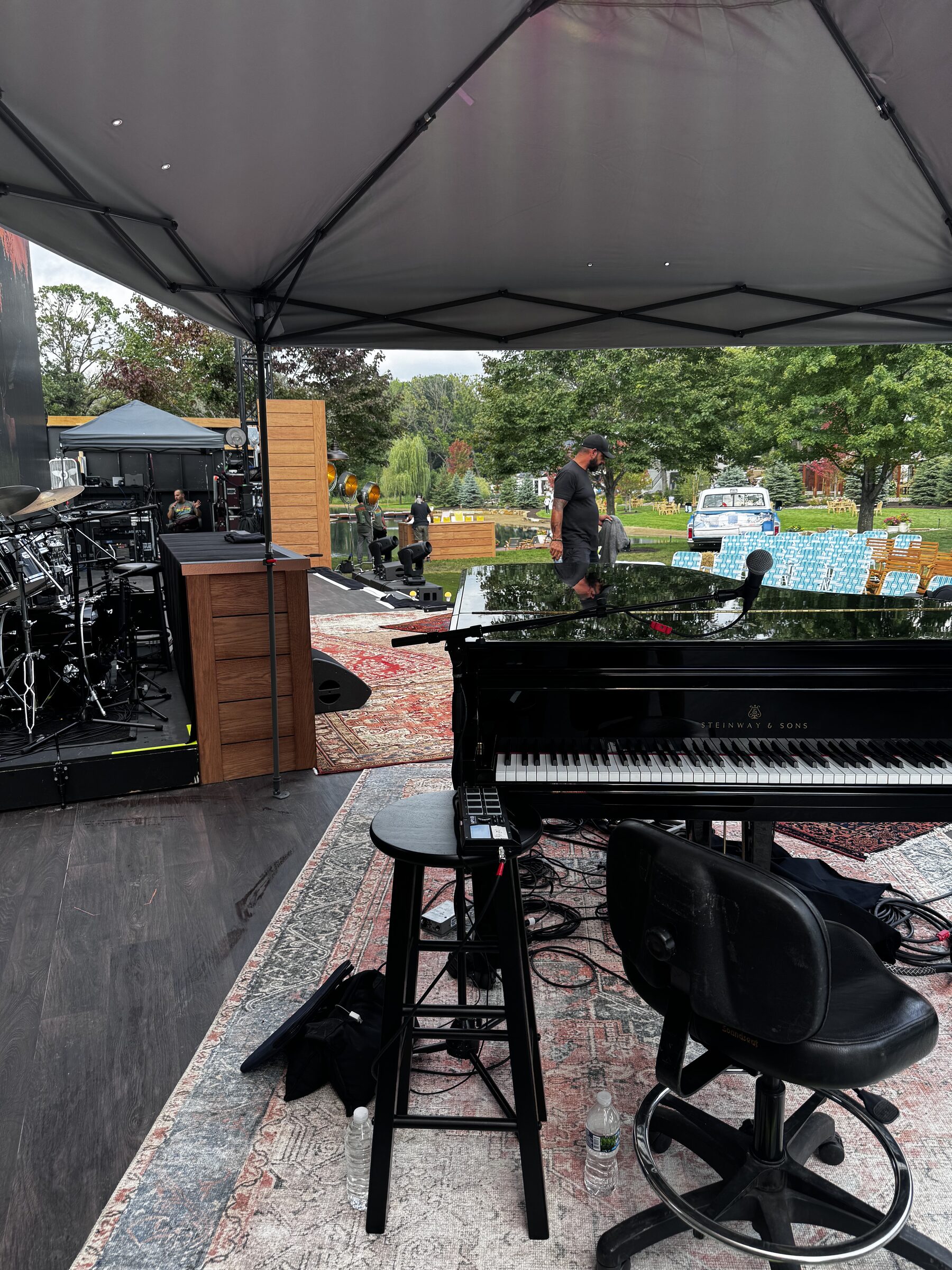 Outdoor live performance stage prepared with instruments and production equipment
