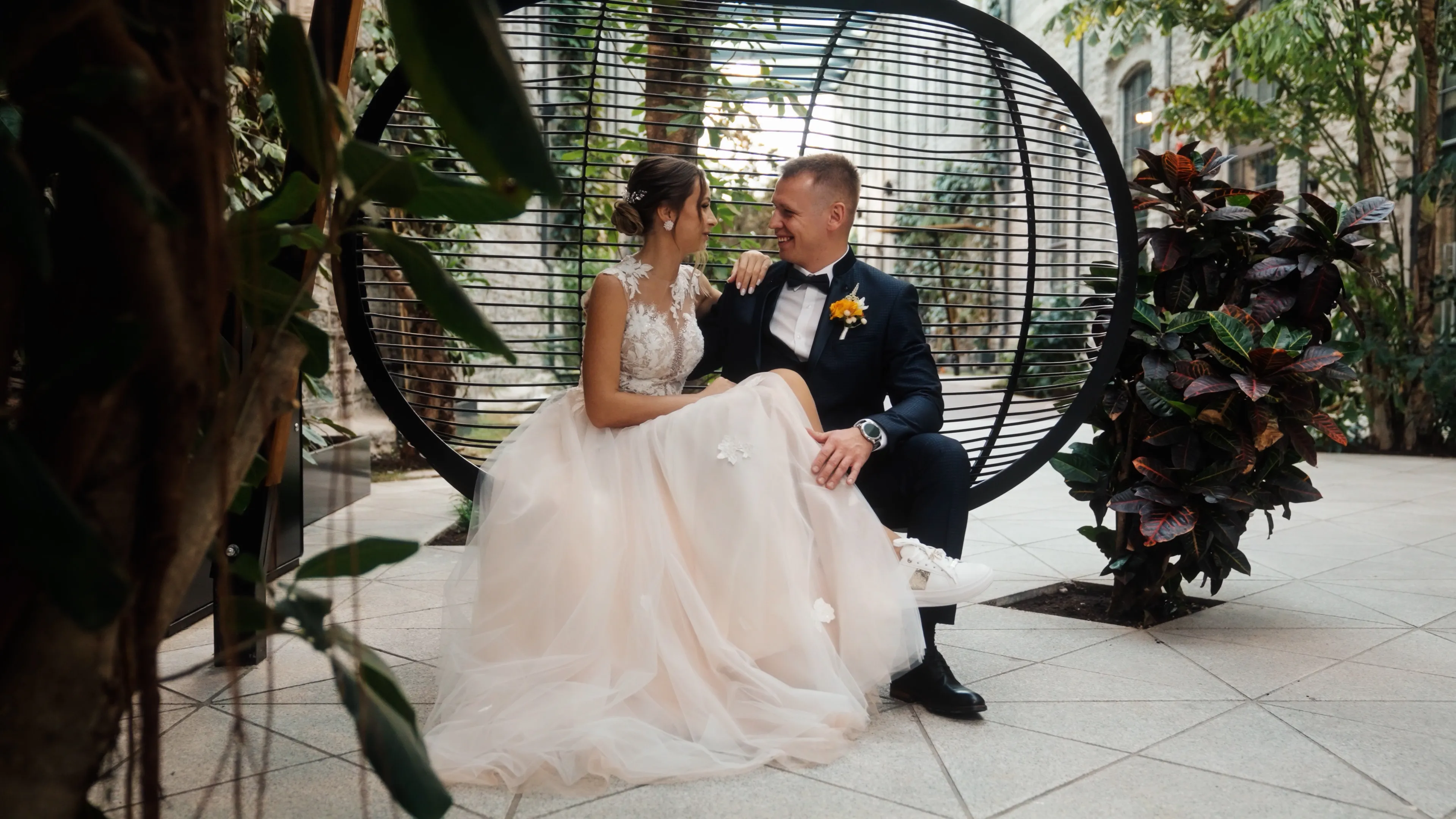 Couple sitting together in a garden