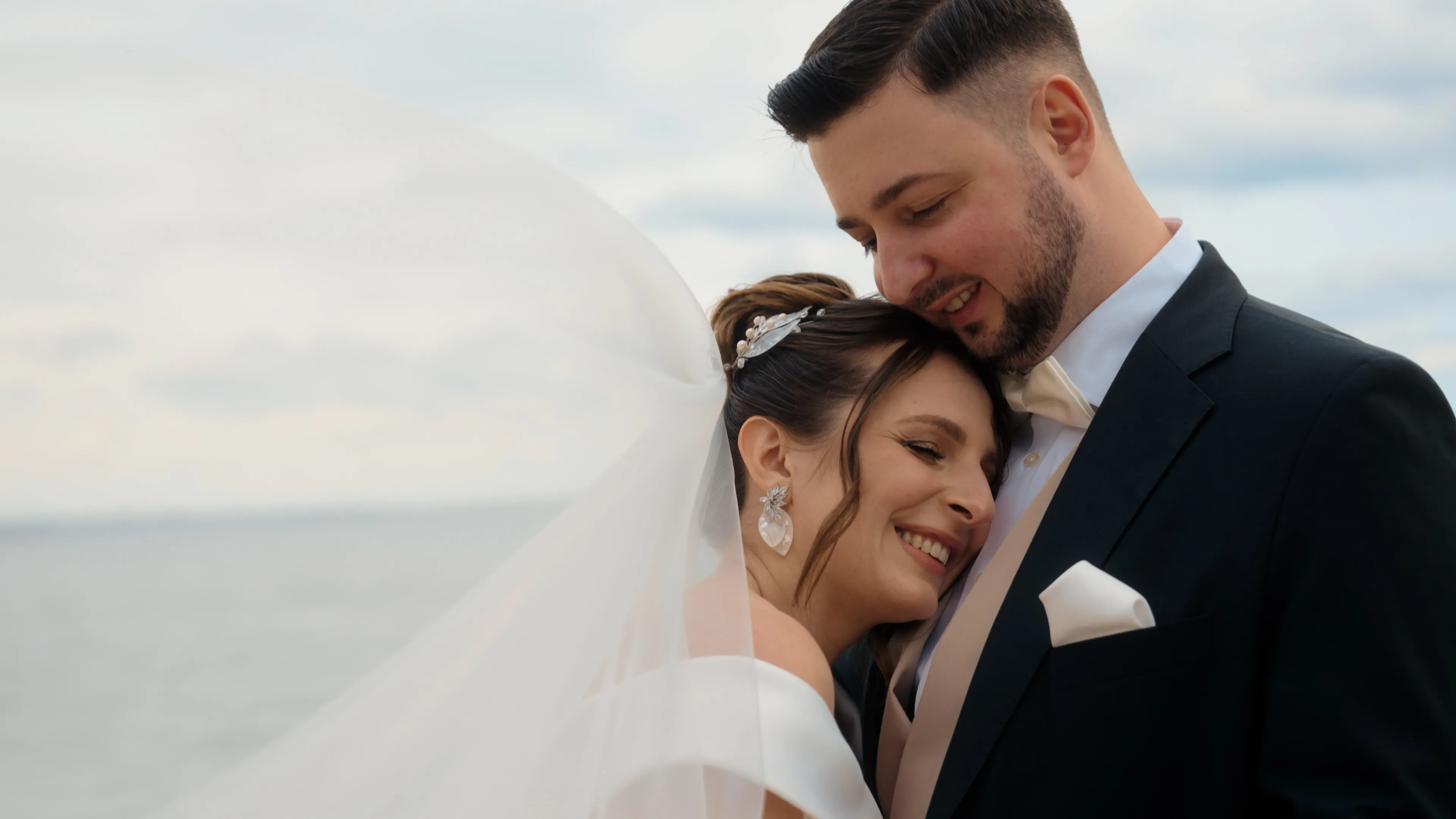 Bride and groom embracing