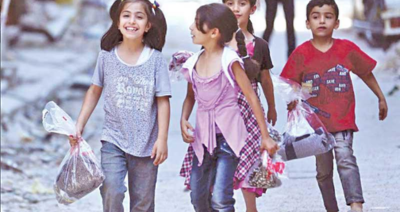 ملابس العيد للايتام مع جمعية المحافظة على القرآن الكريم