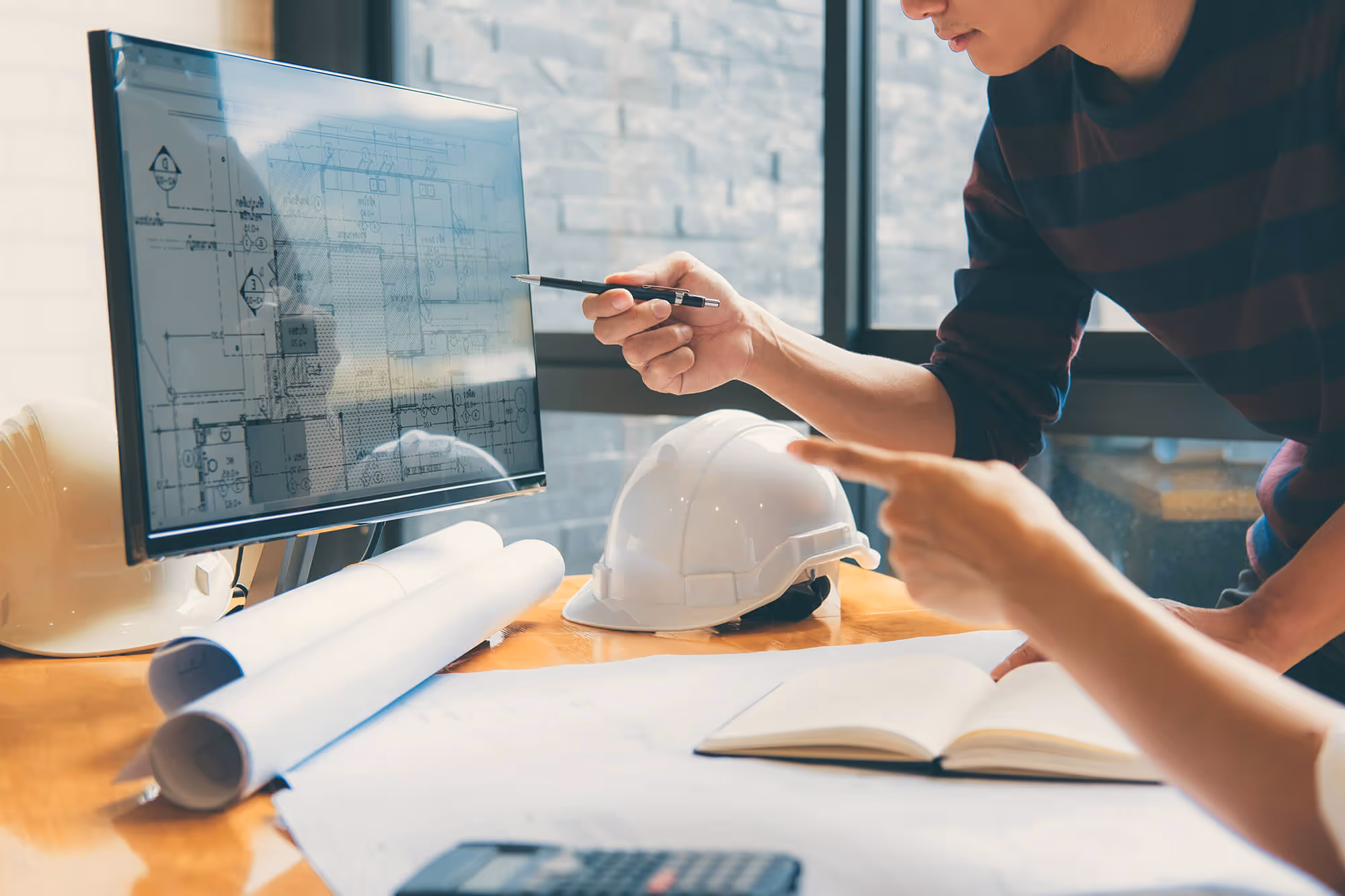 Construction managers working on a takeoff using Togal.AI 
