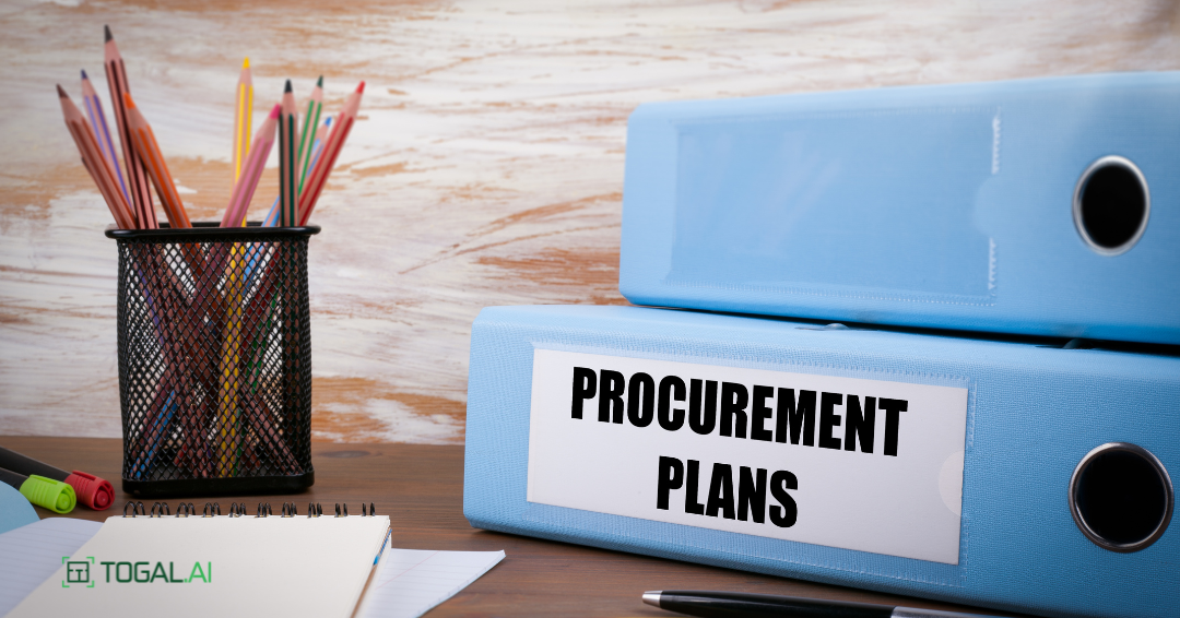 A blue binder labeled as Construction Procurement Plans