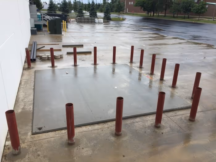 bollards around tank pad