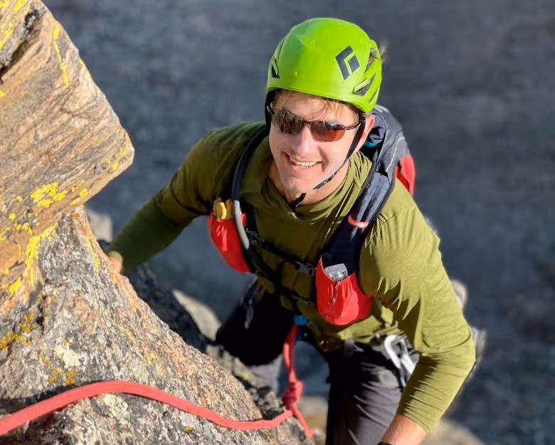 Boulder Rock Climbing Gallery Photo - smiling man rock climbing
