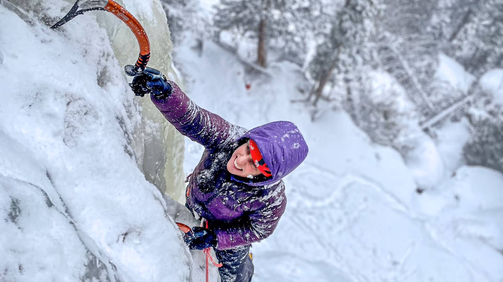 Photo of woman ice climbing near Boulder Colorado