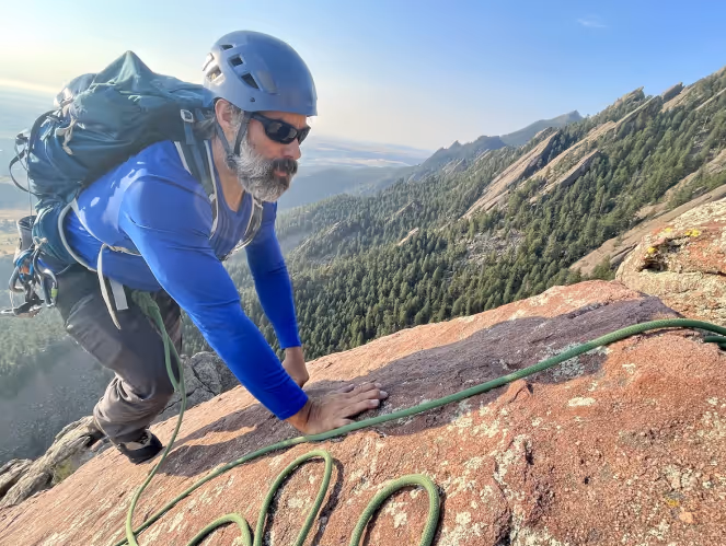 Man climbing the Boulder Flatirons
