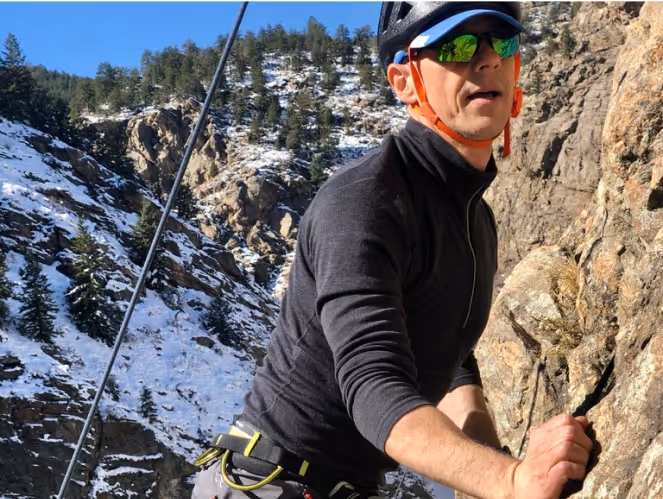 Man rock climbing in Clear Creek Canyon