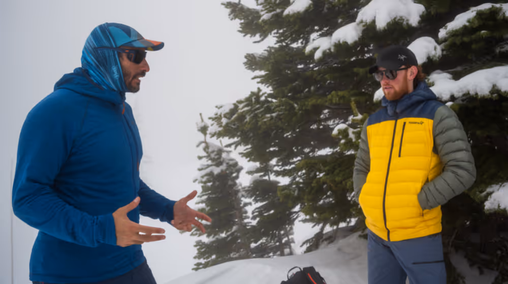 Max Lurie explaining core rock climbing concepts to student