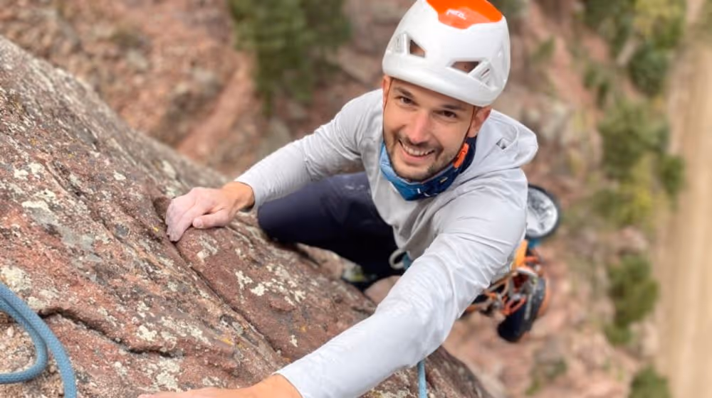 Photo of man rock climbing in Colorado