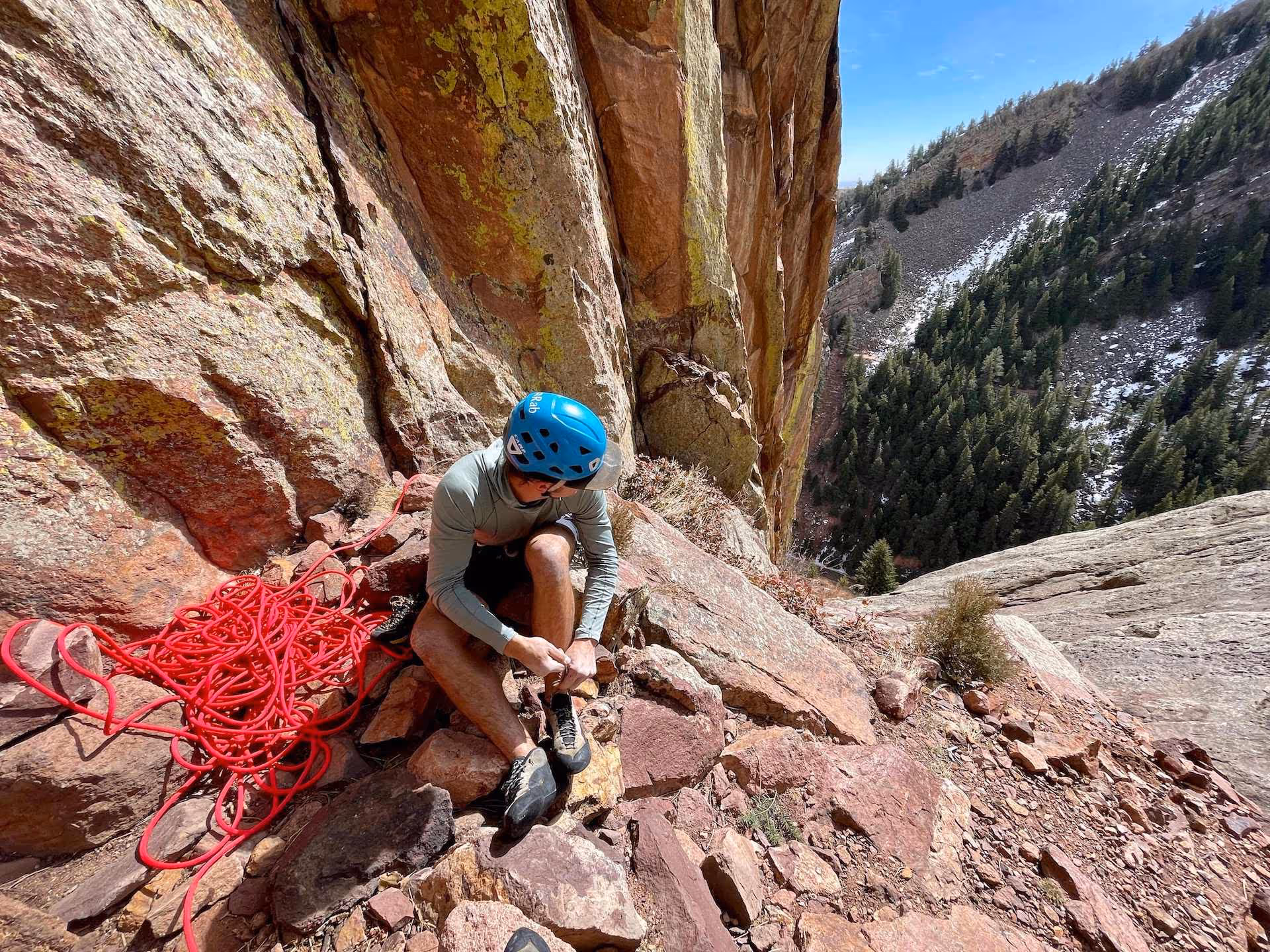Man finishing rock climb at Eldorado Canyon.