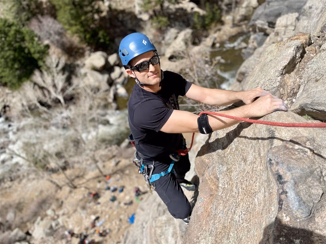Athletic man climbing at clear creek canyon