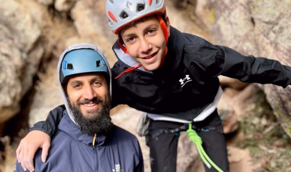 Father and son rock climbing with Alpine to the Max