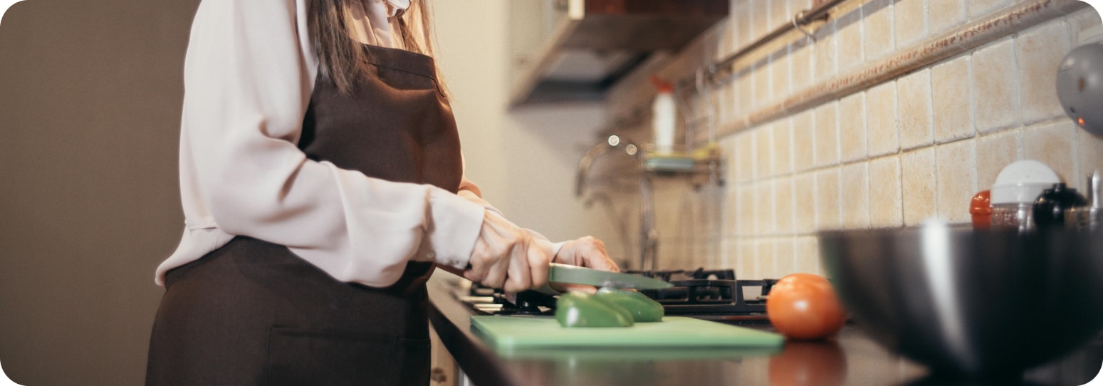 Woman chopping veggies