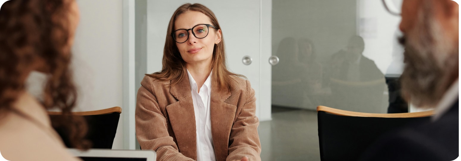Professional woman answering questions for a couple