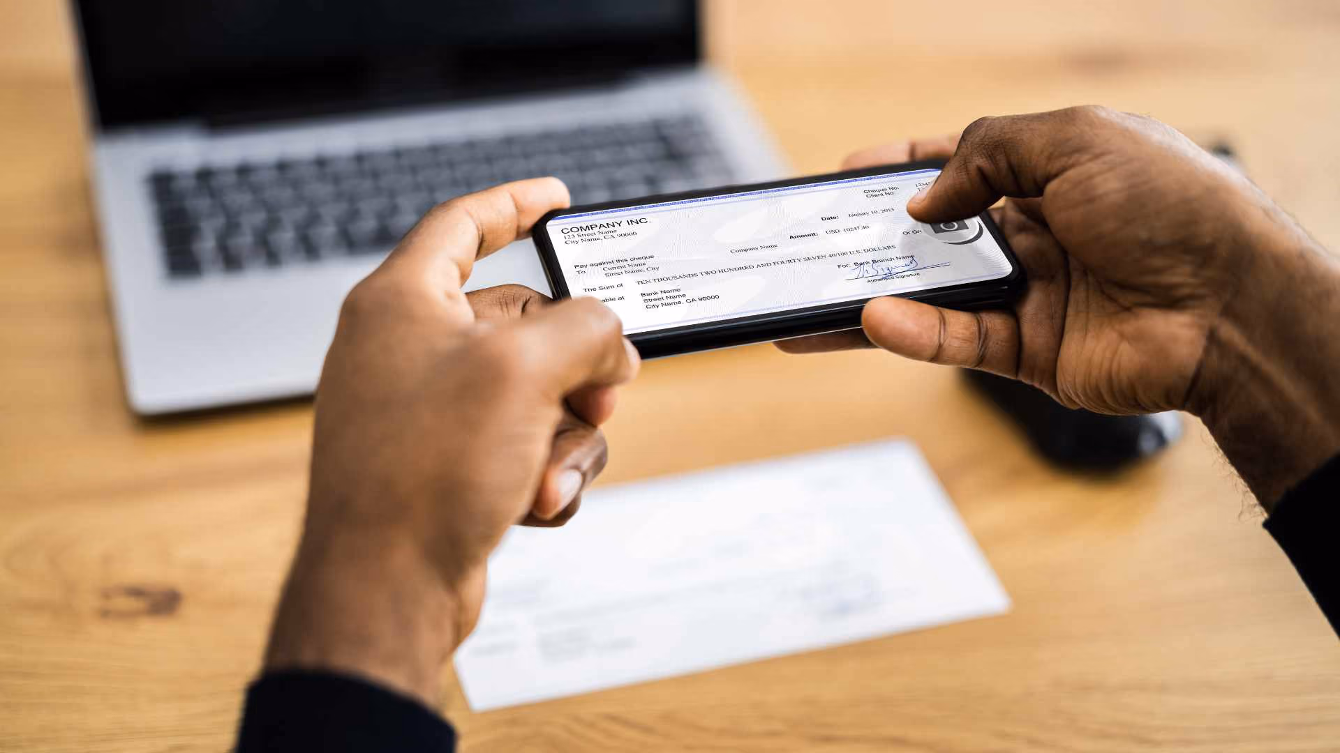 Human taking a picture of a mobile deposit