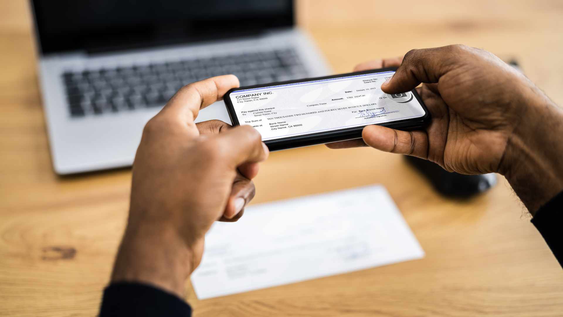 Human taking a picture of a mobile deposit