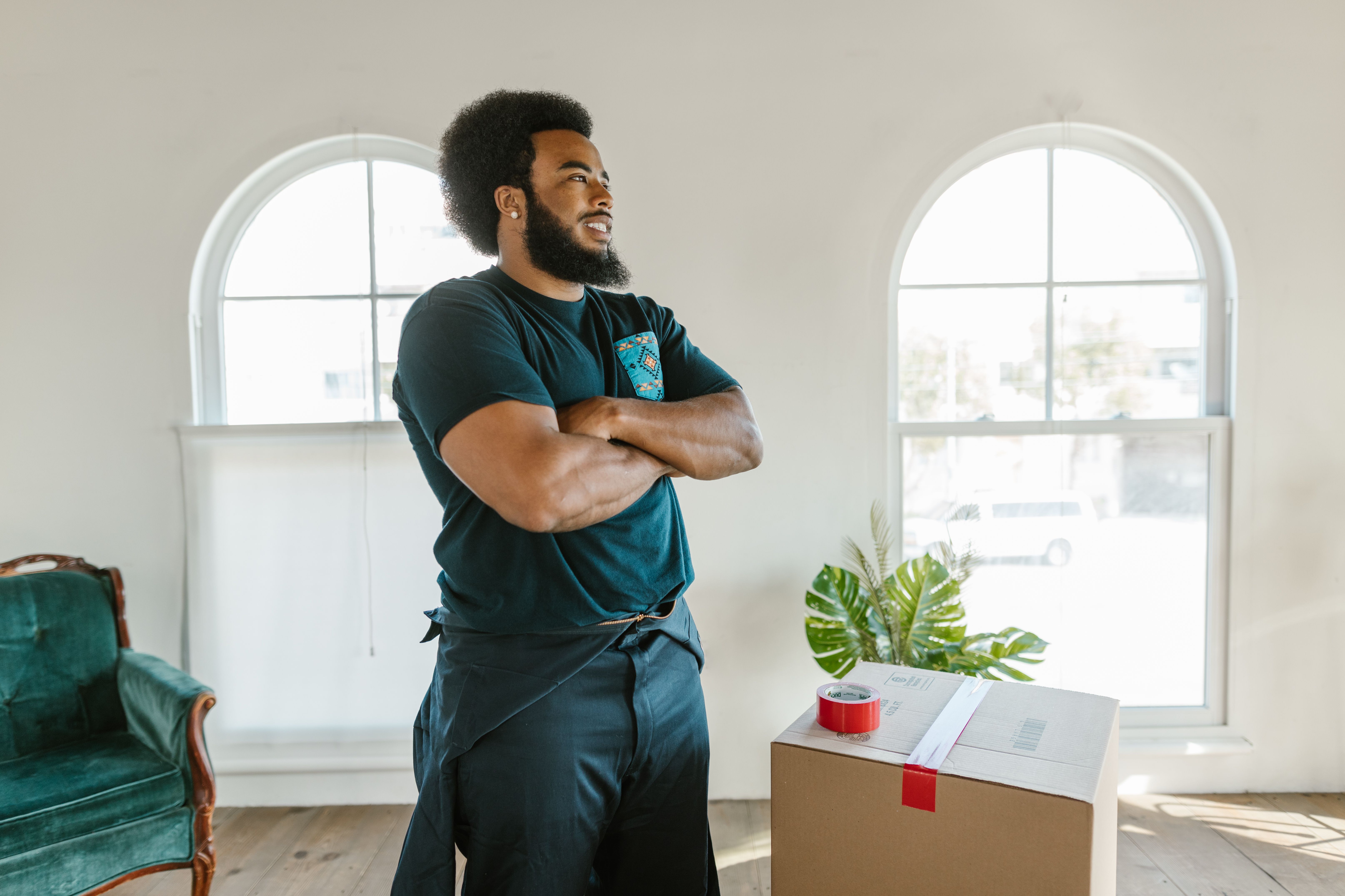 A mover looking at a new house inside