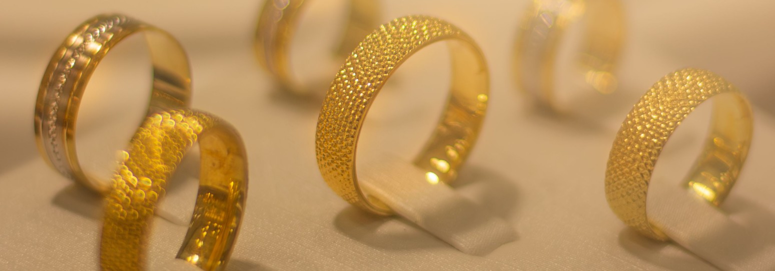 a showcase display of golden rings