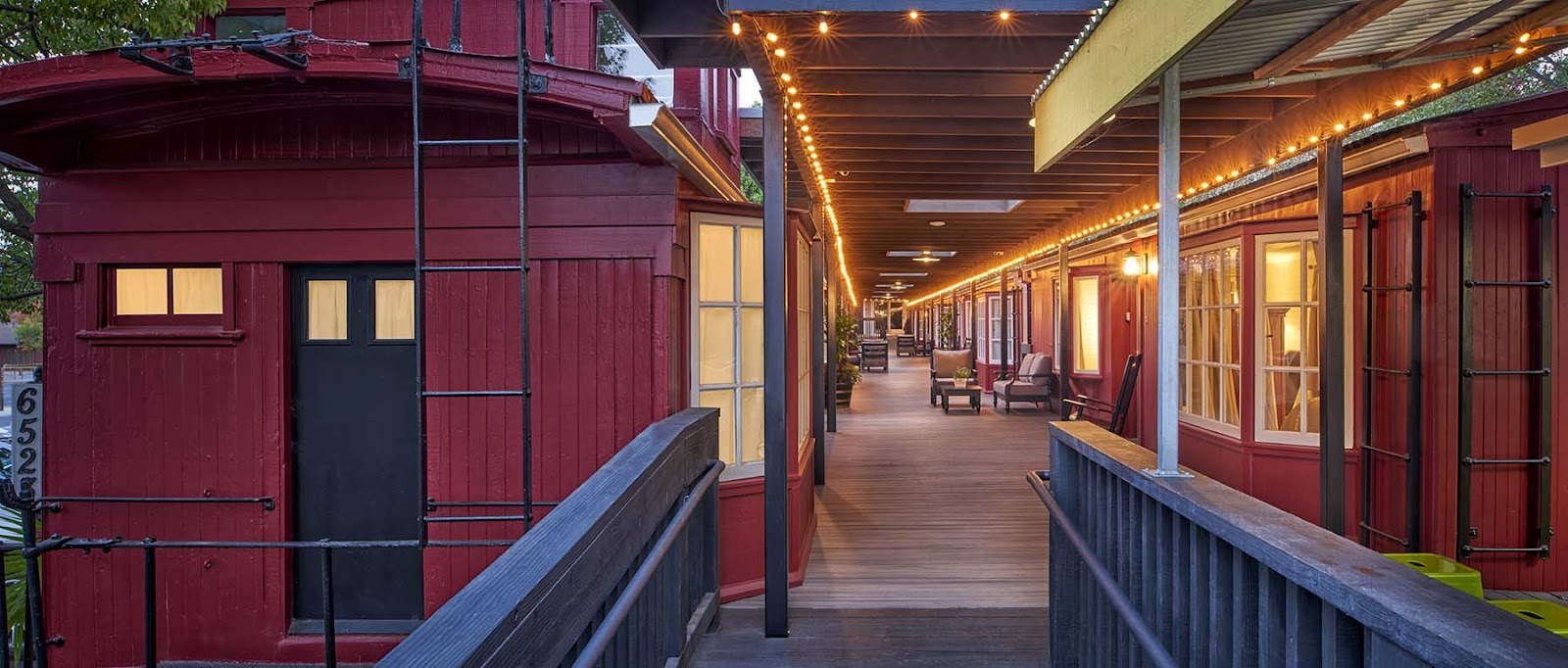 Napa Valley Railway Inn Yountville exterior entrance with rail car rooms